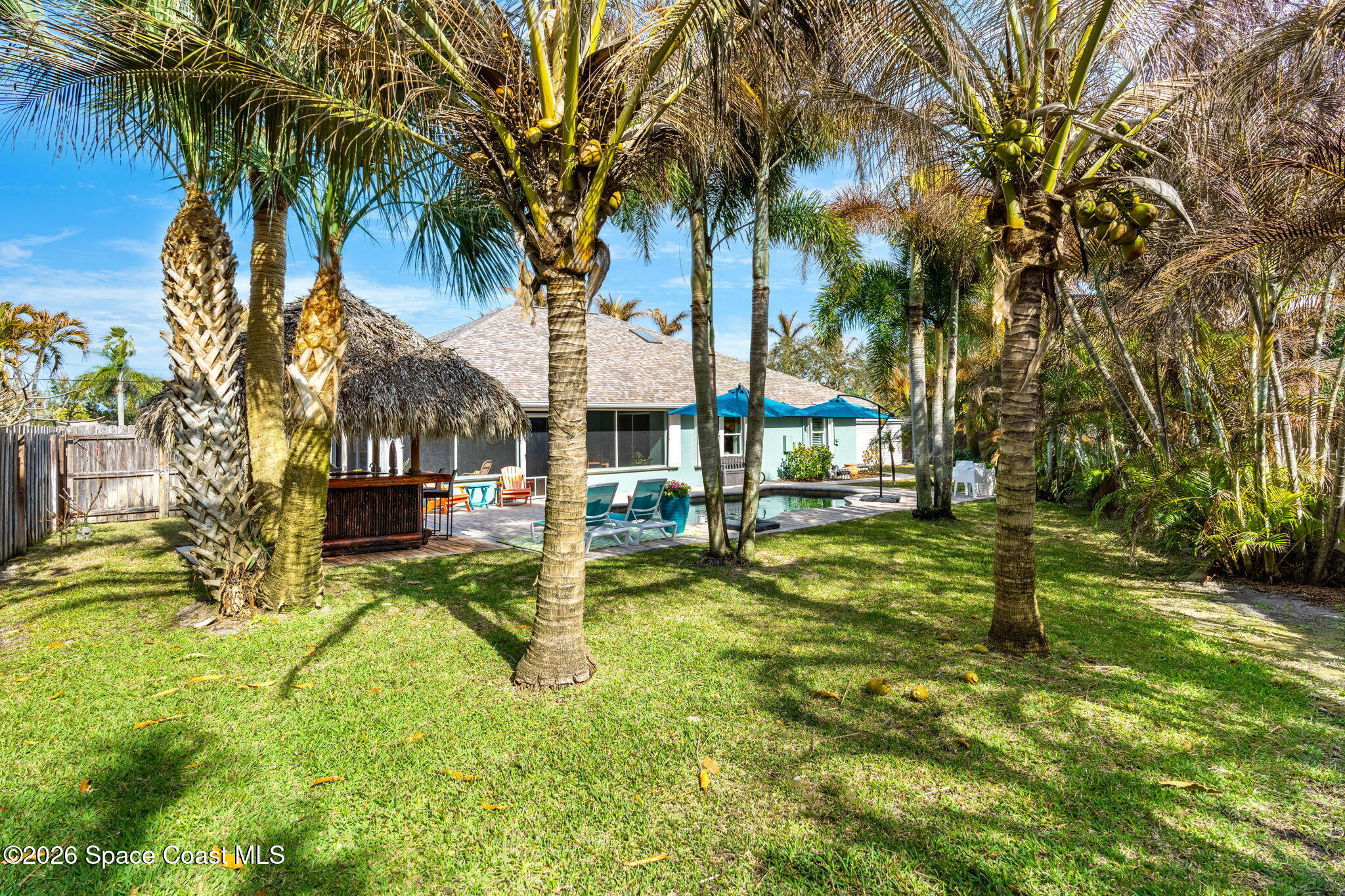 3 Jennifer Circle Indialantic, FL 32903 - Photo 50 of 61 a view of swimming pool with a table and chairs