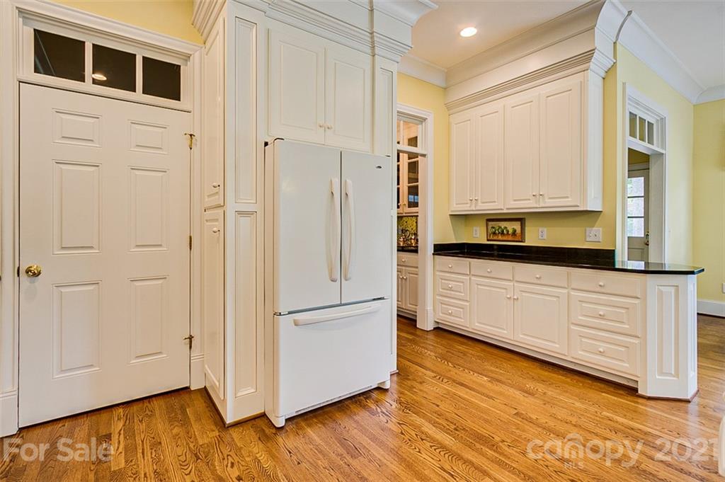 2215 Old Lexington Road Asheboro, NC 27205 - Photo 12 of 48 a kitchen with stainless steel appliances granite countertop a refrigerator a stove and a microwave