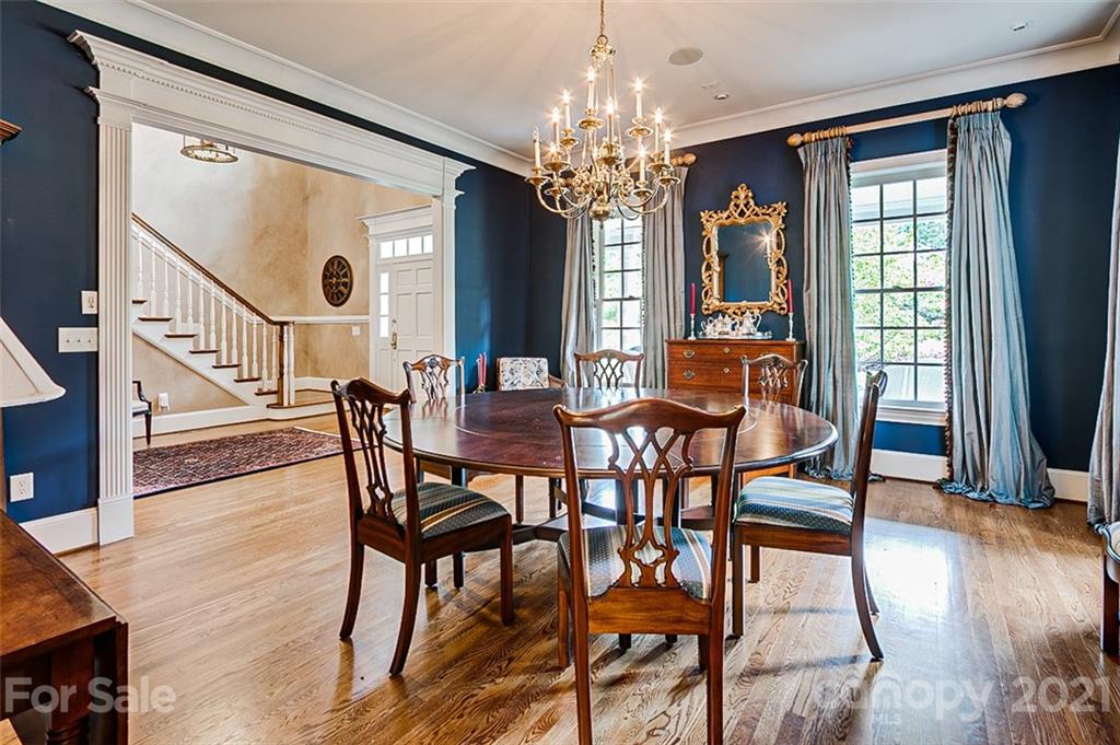 2215 Old Lexington Road Asheboro, NC 27205 - Photo 15 of 48 a view of a dining room with furniture window and wooden floor