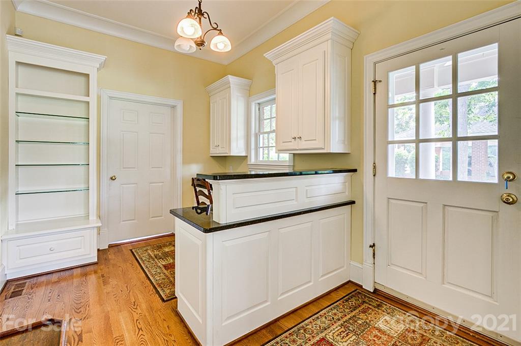2215 Old Lexington Road Asheboro, NC 27205 - Photo 16 of 48 a spacious bathroom with a granite countertop sink and a mirror