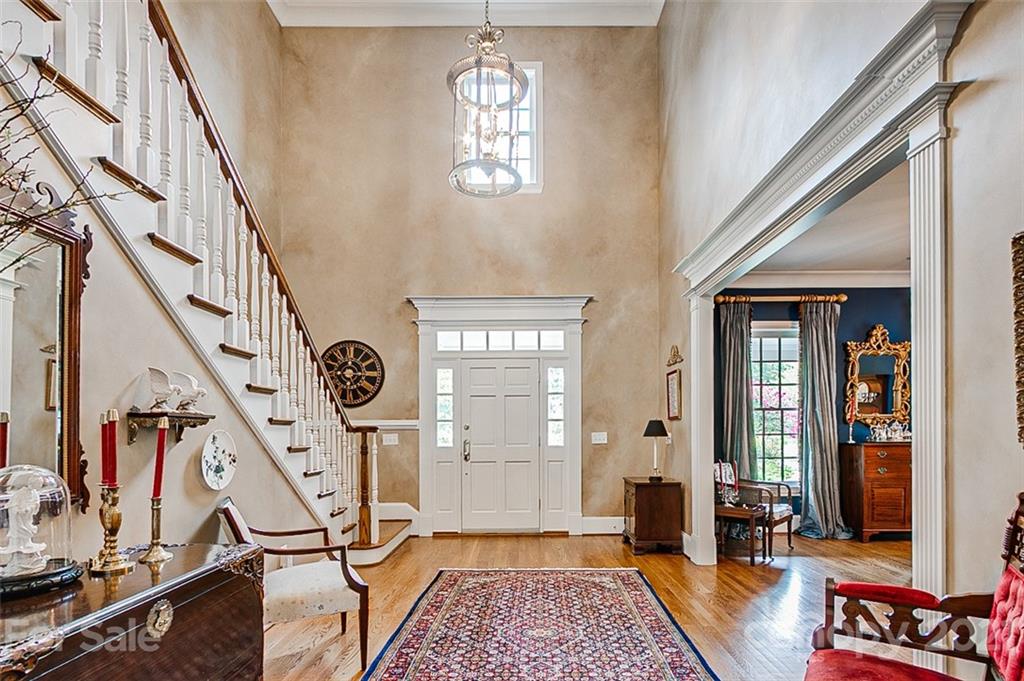 2215 Old Lexington Road Asheboro, NC 27205 - Photo 3 of 48 a view of an entryway with wooden floor and windows
