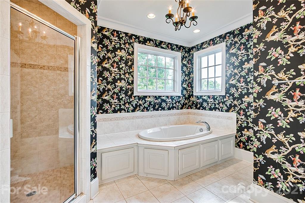 2215 Old Lexington Road Asheboro, NC 27205 - Photo 24 of 48 a spacious bathroom with a bathtub and shower