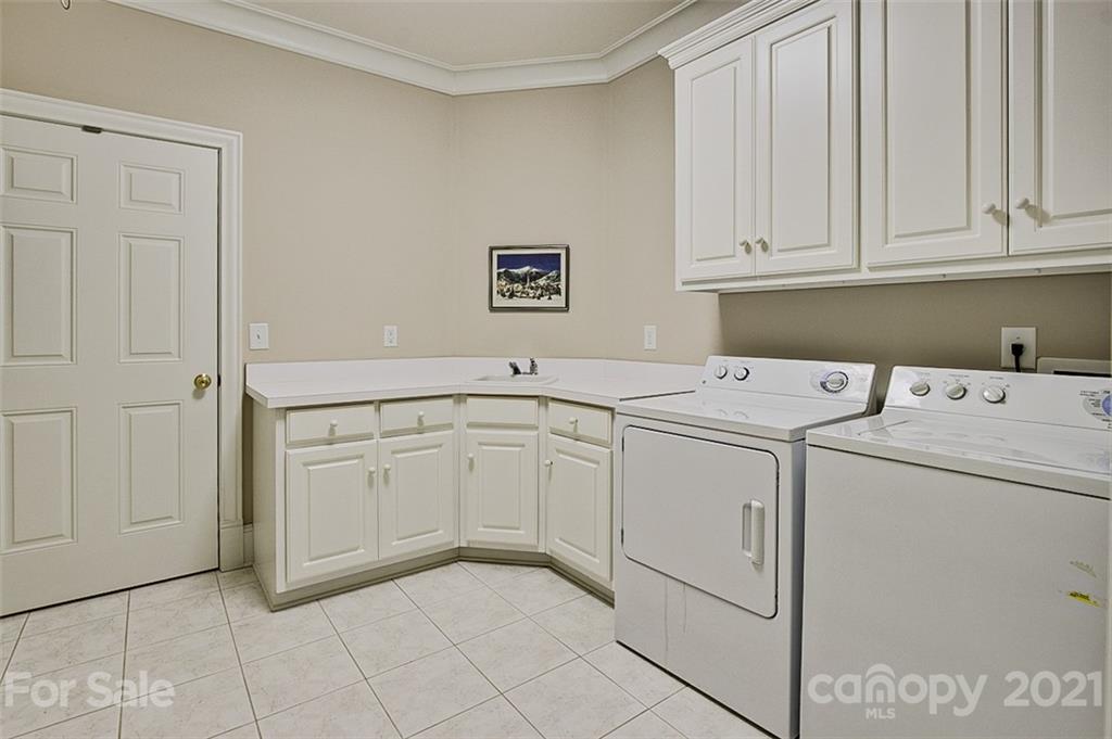 2215 Old Lexington Road Asheboro, NC 27205 - Photo 25 of 48 a utility room with dryer and washer