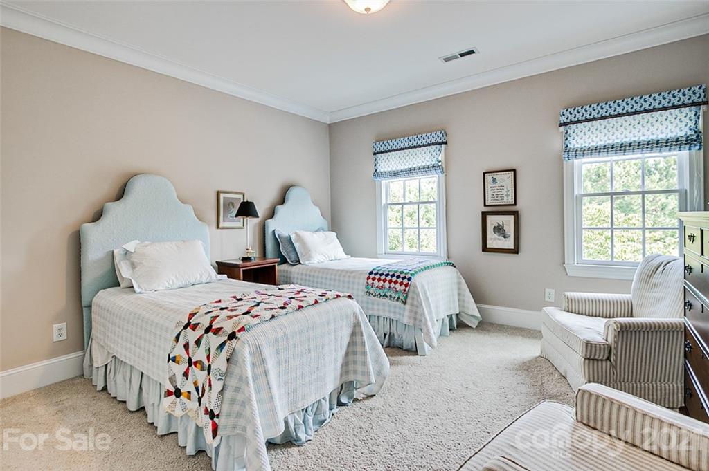 2215 Old Lexington Road Asheboro, NC 27205 - Photo 26 of 48 a bedroom with two beds and large window