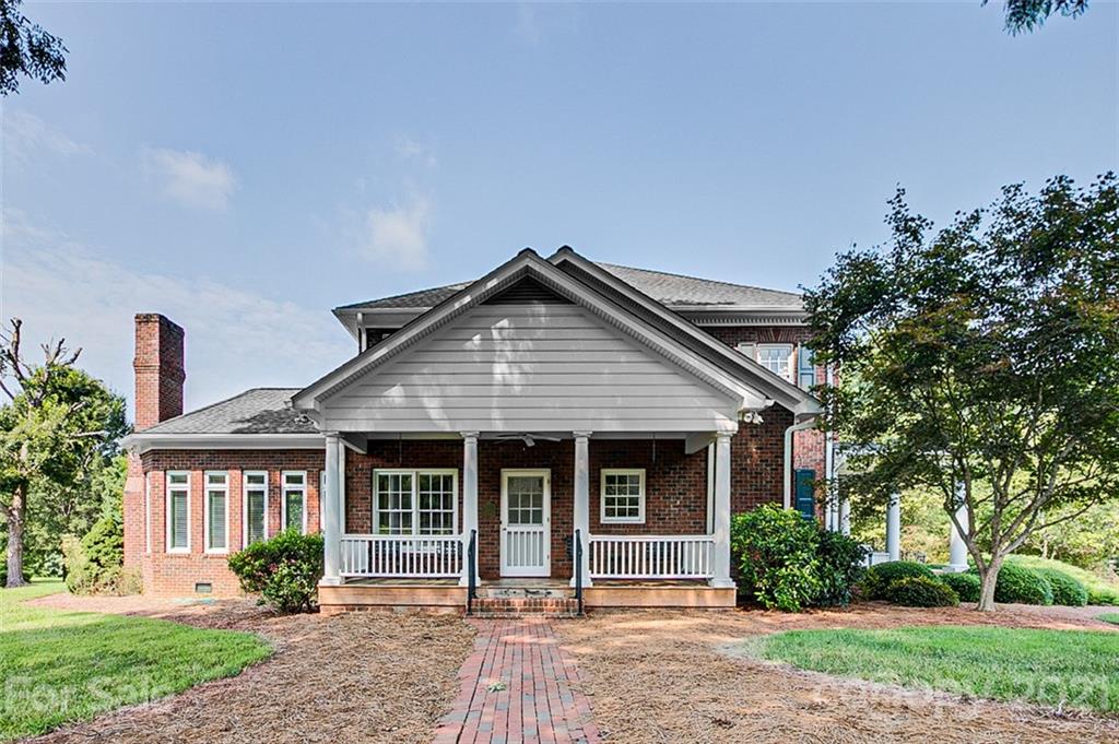 2215 Old Lexington Road Asheboro, NC 27205 - Photo 38 of 48 front view of a house with a yard