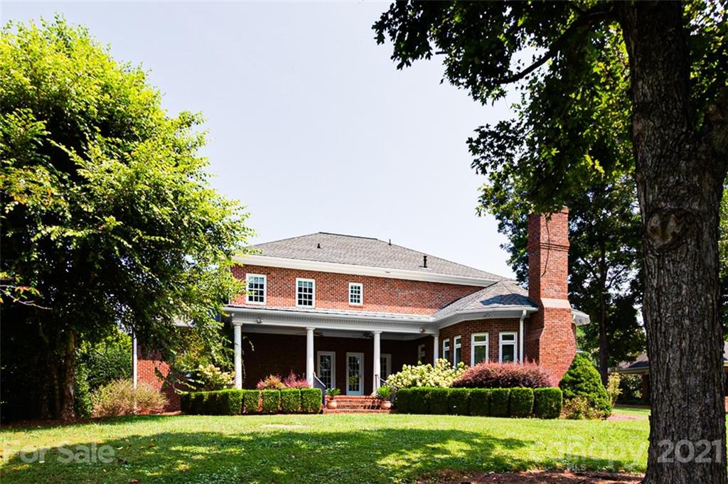 2215 Old Lexington Road Asheboro, NC 27205 - Photo 41 of 48 a front view of a house with garden