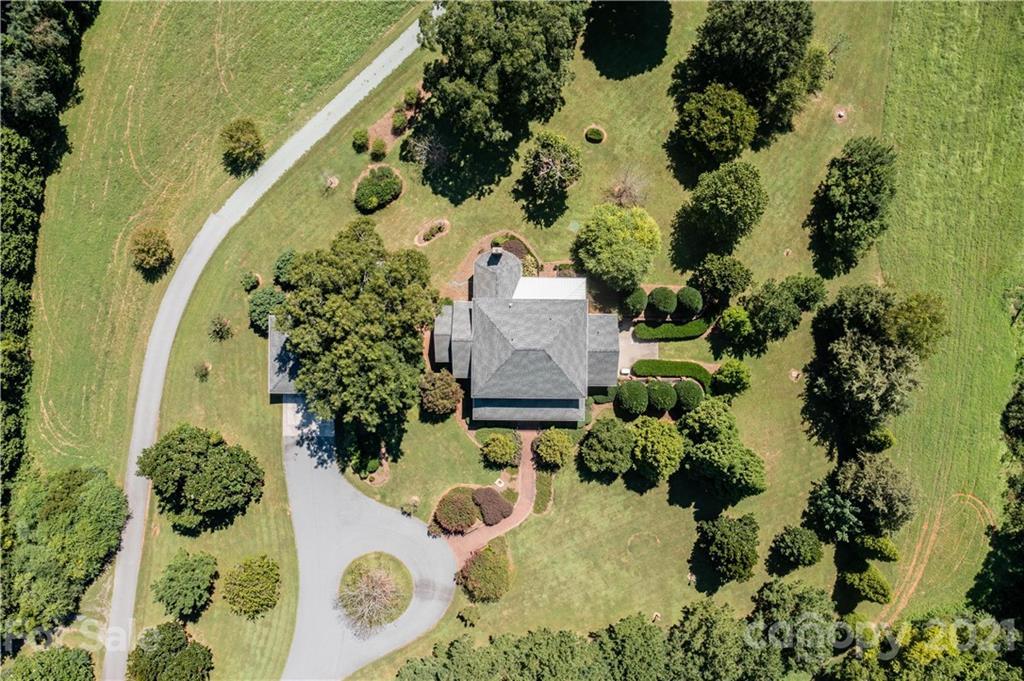 2215 Old Lexington Road Asheboro, NC 27205 - Photo 46 of 48 an aerial view of a house with a yard and garden