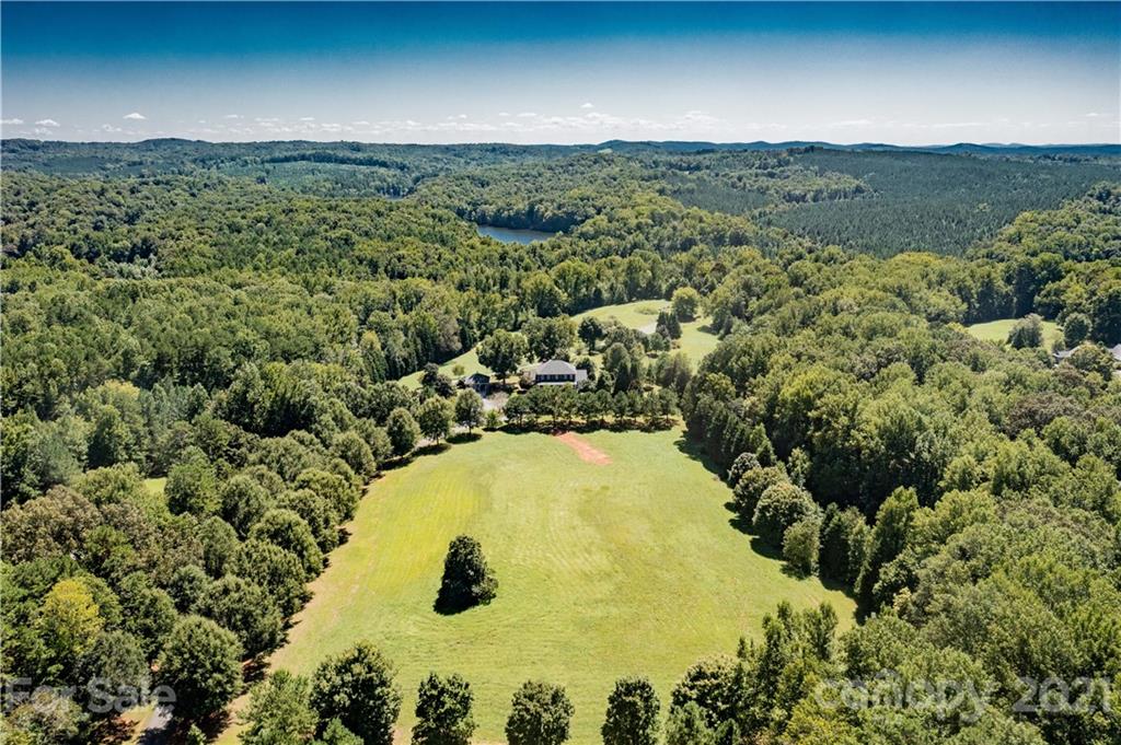 2215 Old Lexington Road Asheboro, NC 27205 - Photo 48 of 48 a view of a swimming pool with a yard