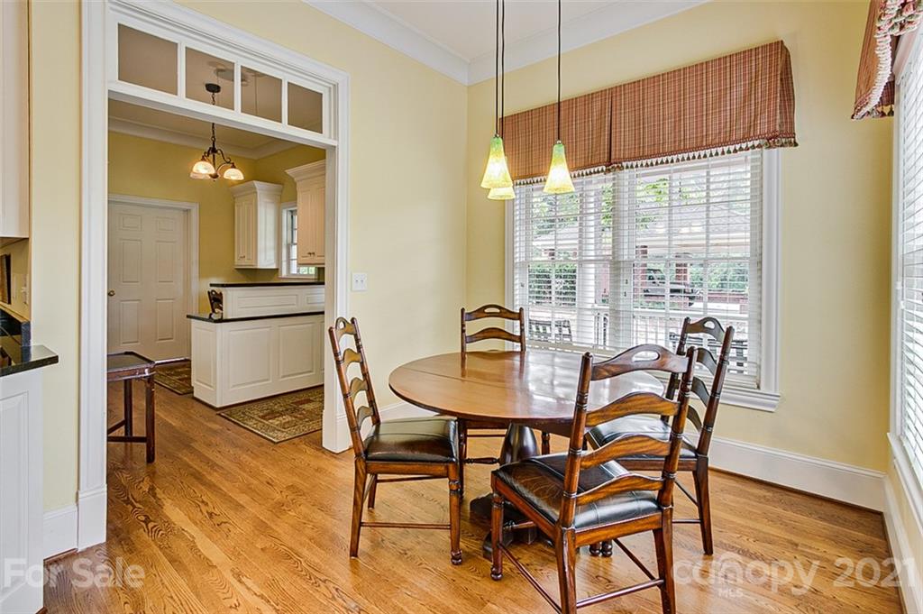 2215 Old Lexington Road Asheboro, NC 27205 - Photo 9 of 48 a view of a dining room with furniture window and wooden floor