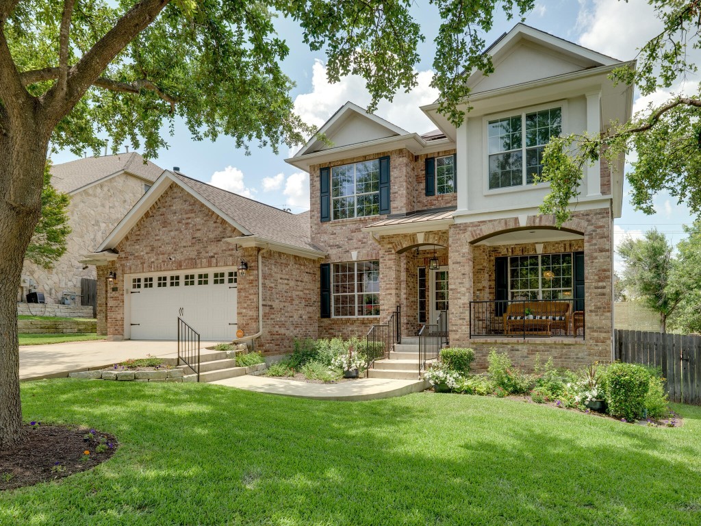 front view of a house with a yard