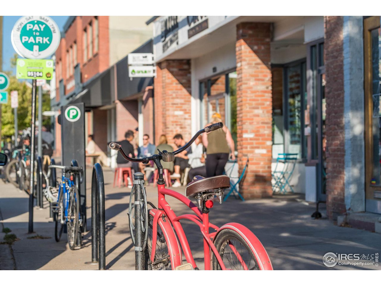 2711 Mapleton Avenue, Unit 2 Boulder, CO 80304 - Photo 26 of 27 a view of living room filled with furniture and floor to ceiling windows