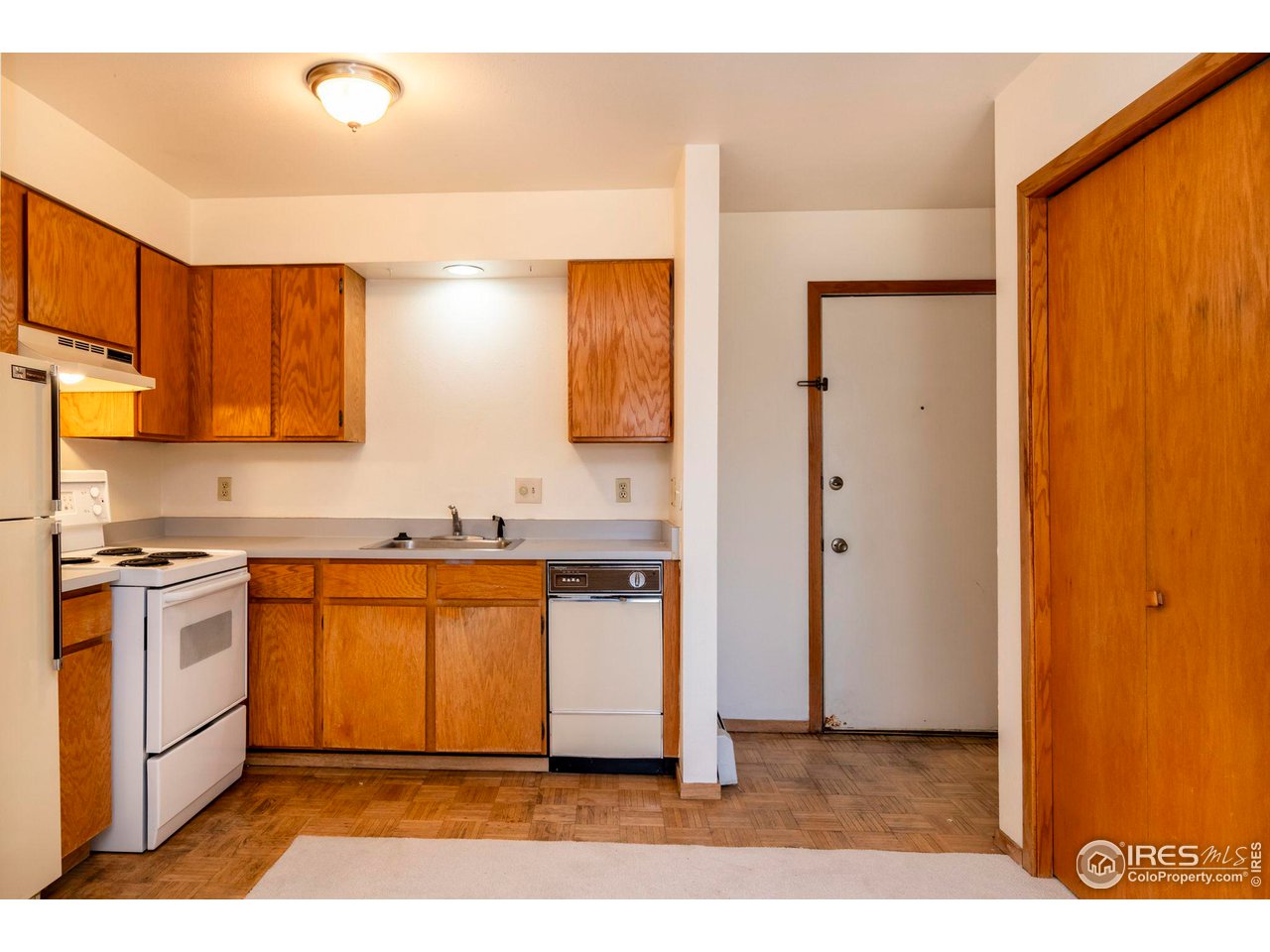 2711 Mapleton Avenue, Unit 2 Boulder, CO 80304 - Photo 8 of 27 a kitchen with stainless steel appliances granite countertop a refrigerator and a sink