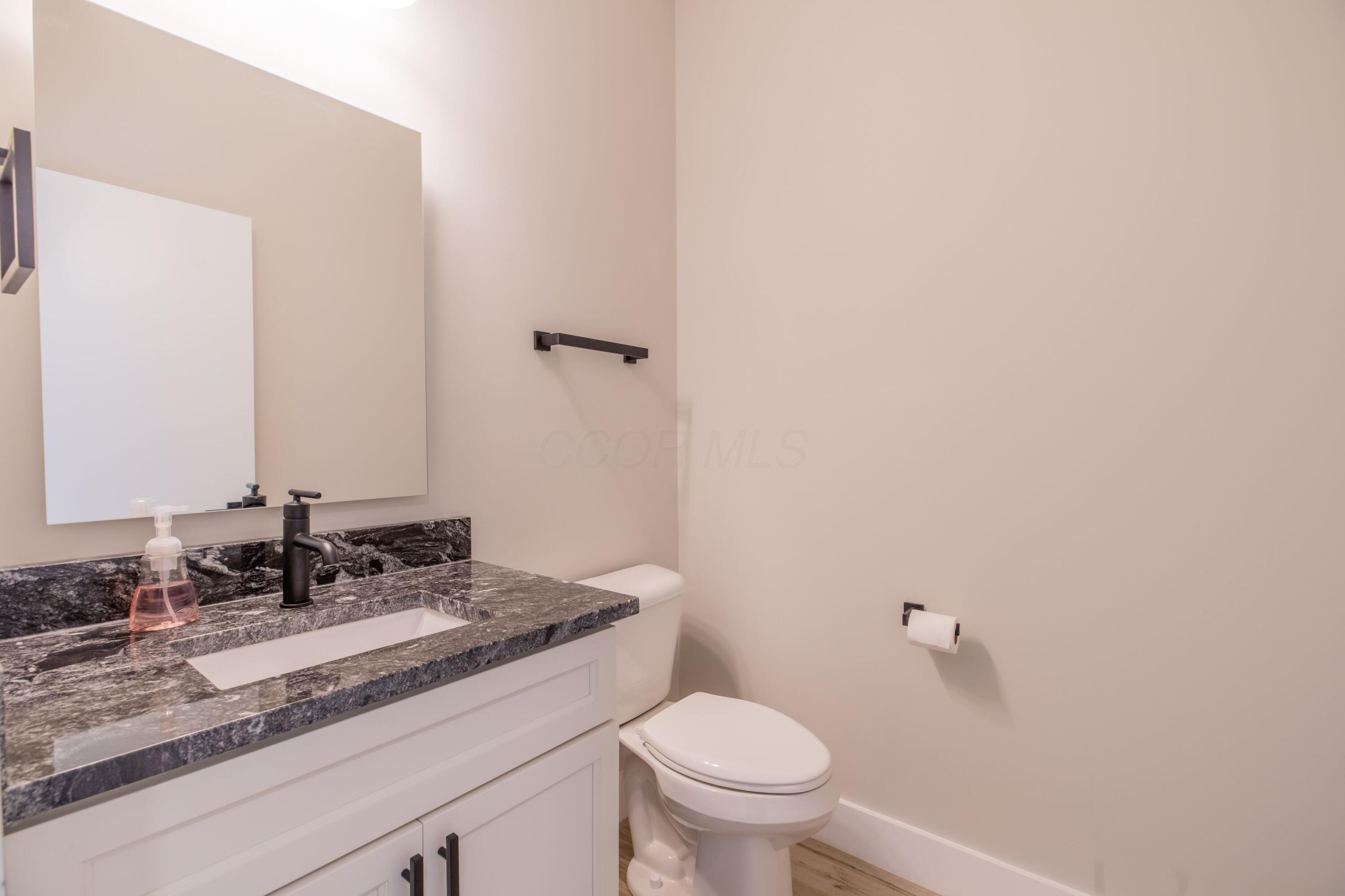 151 Apple Blossom Road Southwest Pataskala, OH 43062 - Photo 26 of 40 Half bath off foyer