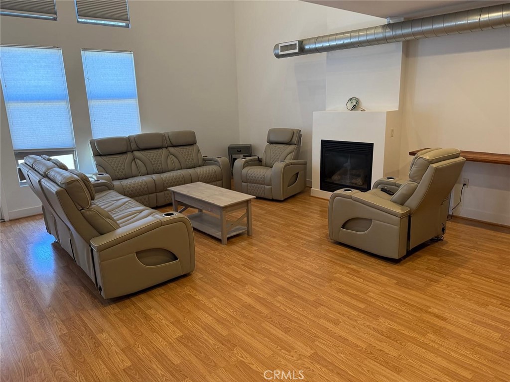 550 South Brea Boulevard Brea, CA 92821 - Photo 3 of 17 a living room with furniture and a fireplace