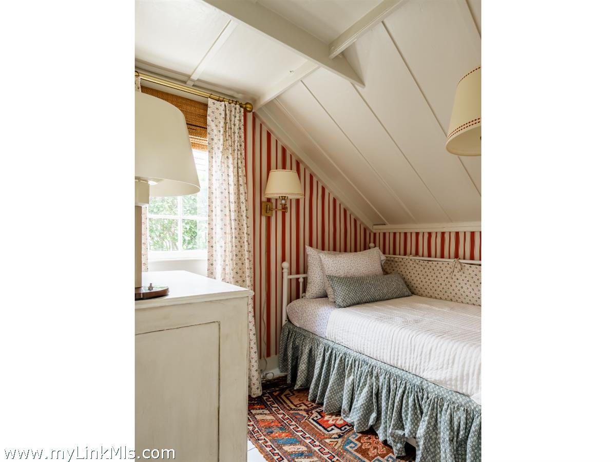 10 Centre Street Nantucket, MA 02554 - Photo 25 of 43 a bedroom with a bed and a window