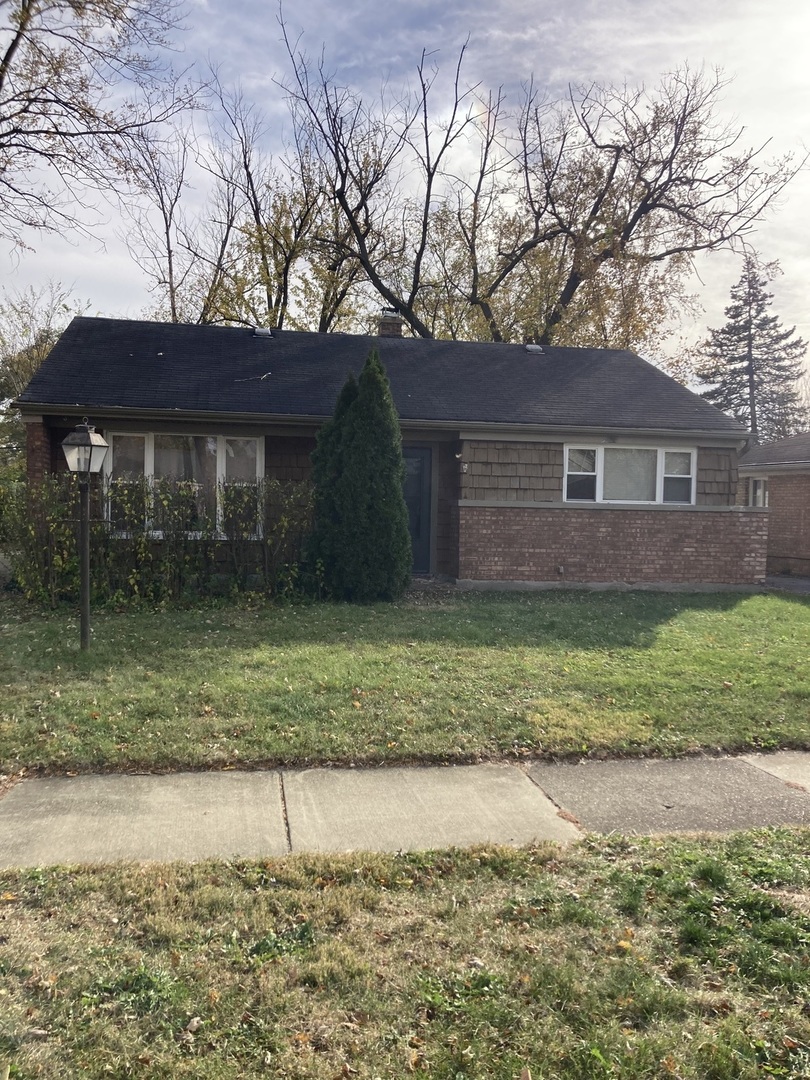 2155 Spruce Road Homewood, IL 60430 - Photo 1 of 18 a view of house with a yard