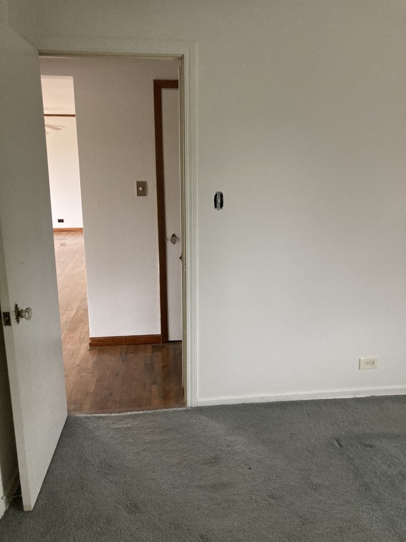 2155 Spruce Road Homewood, IL 60430 - Photo 5 of 18 an empty room with windows