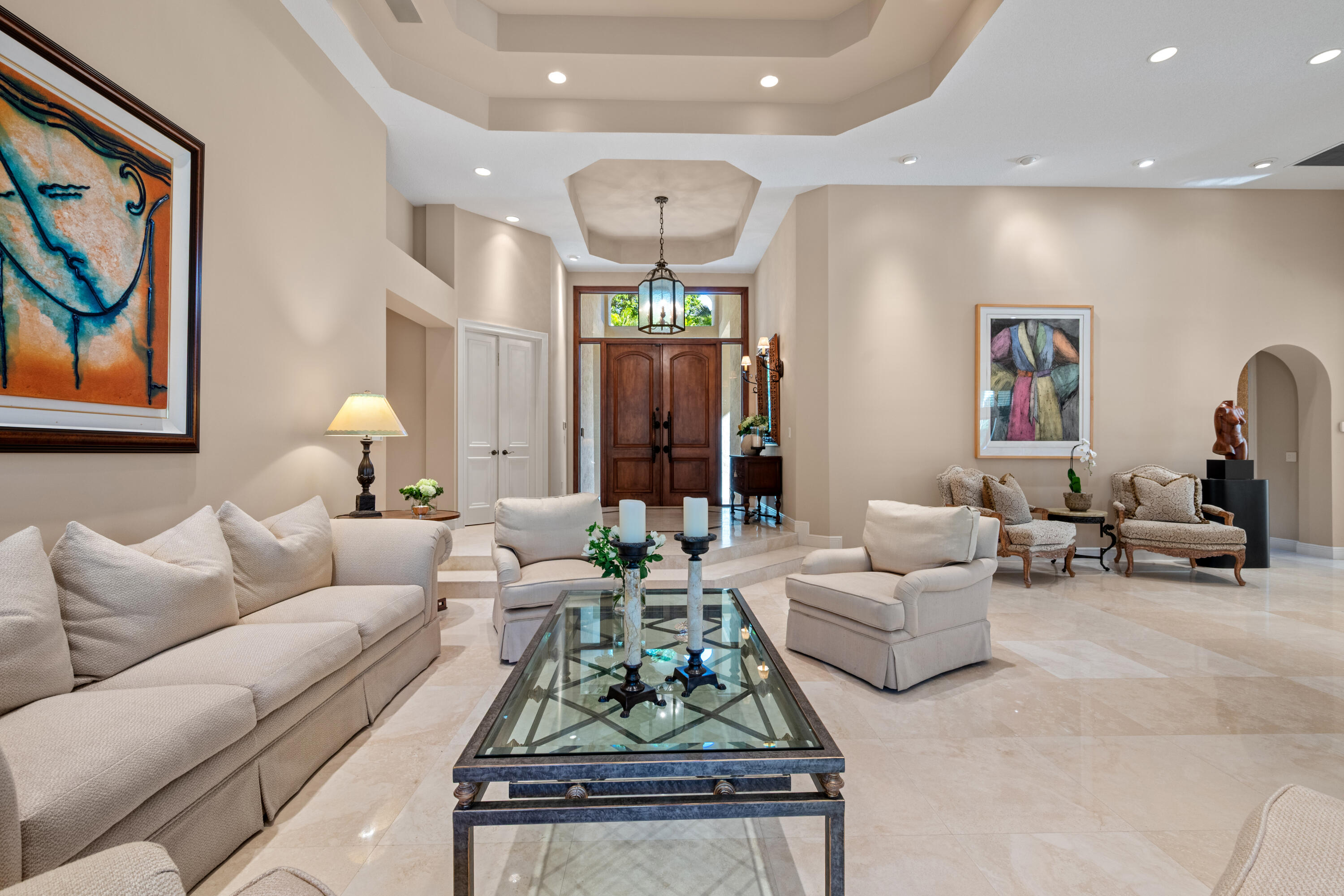 18800 Long Lake Drive Boca Raton, FL 33496 - Photo 8 of 60 a living room with furniture chandelier and a large window