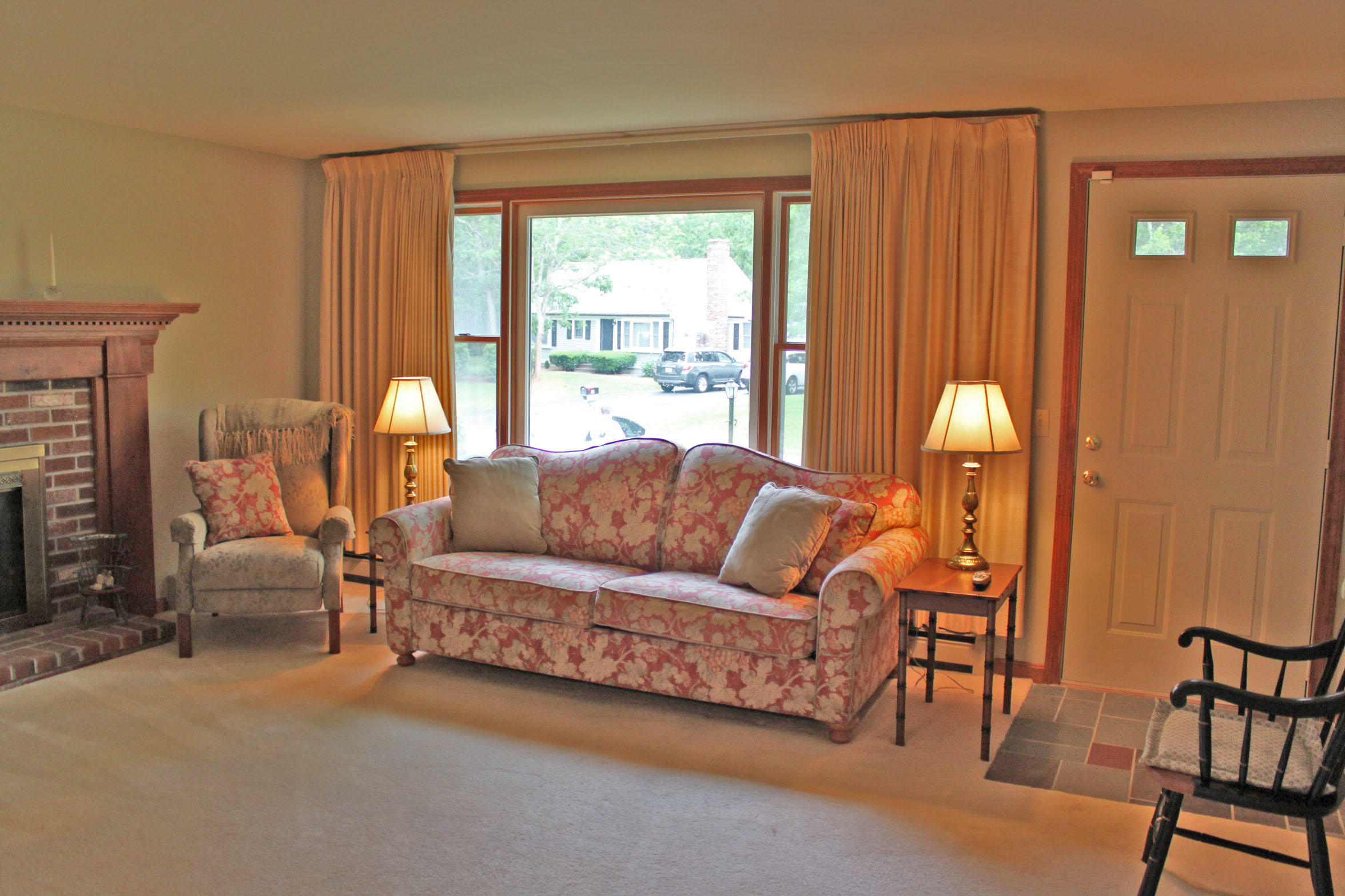 149 Camelback Road Marstons Mills, MA 02648 - Photo 2 of 25 a living room with furniture and a fireplace