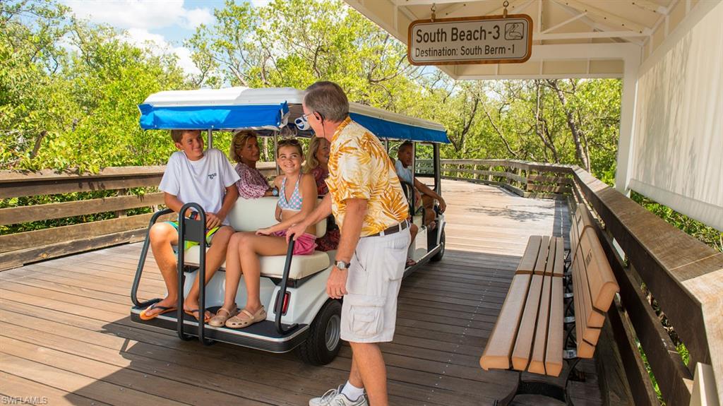 6545 Valen Way, Unit F205 Naples, FL 34108 - Photo 31 of 40 a view of stairs and an outdoor kitchen