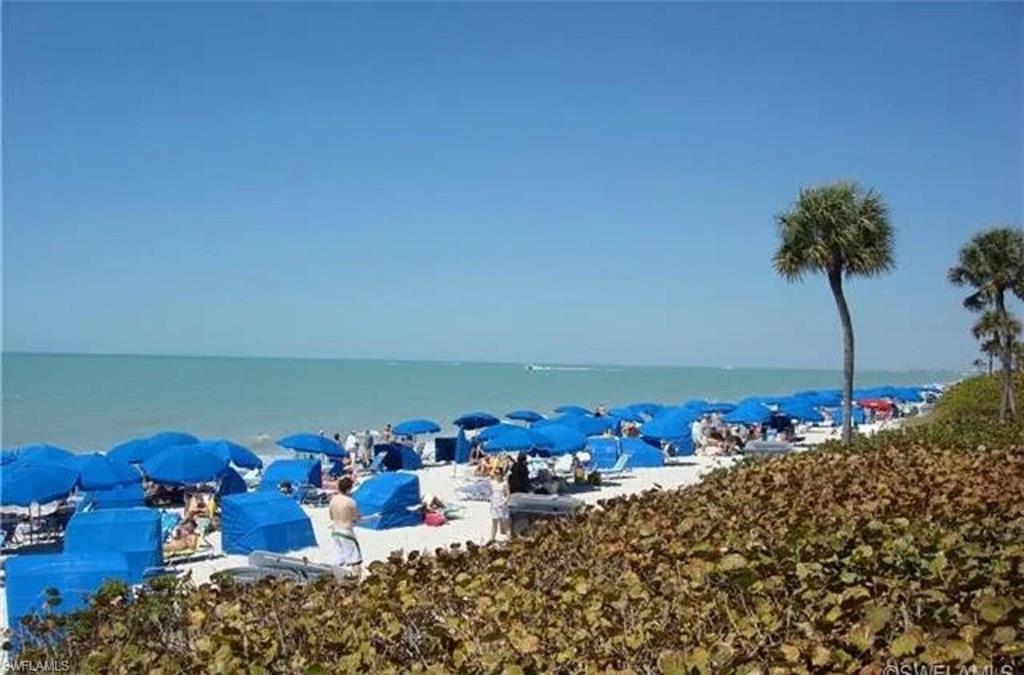 6545 Valen Way, Unit F205 Naples, FL 34108 - Photo 32 of 40 a view of a terrace with chairs