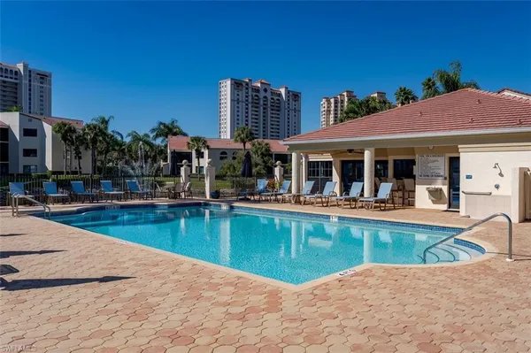 a view of a house with swimming pool