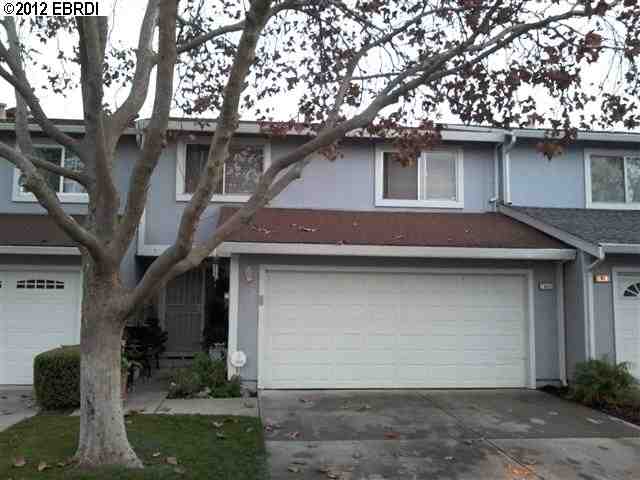 81 Sea Point Way Pittsburg, CA 94565 - Photo 1 of 1 a house with trees in the background