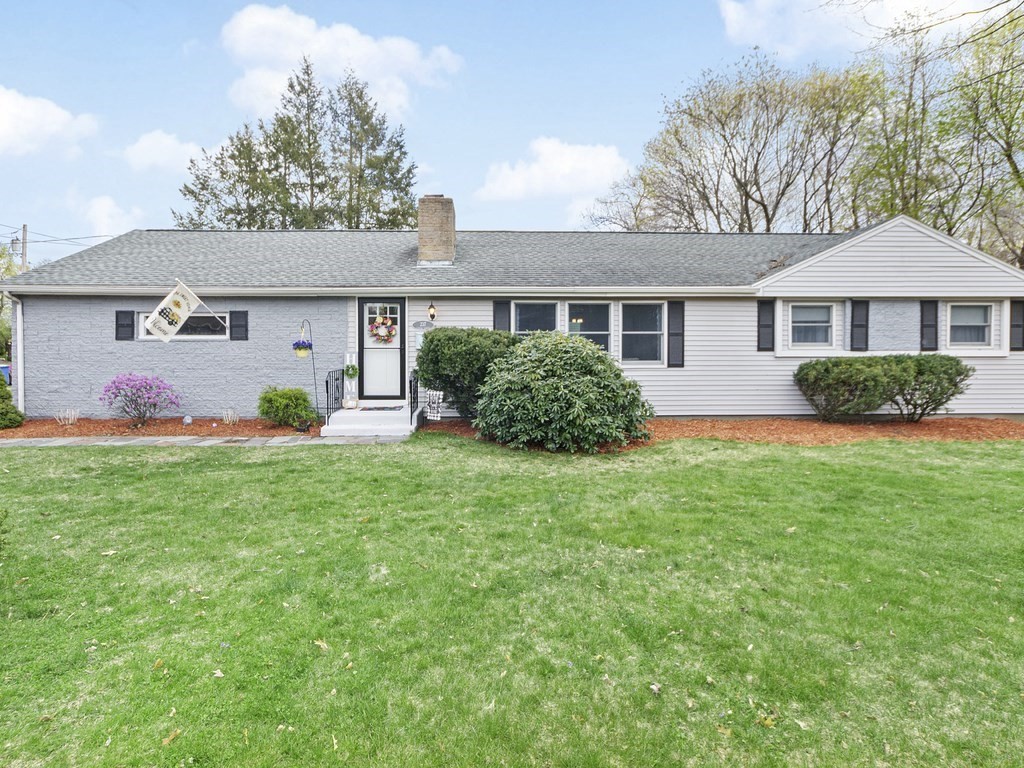 237 Linden Street Waltham, MA 02452 - Photo 1 of 33 front view of a house with a yard
