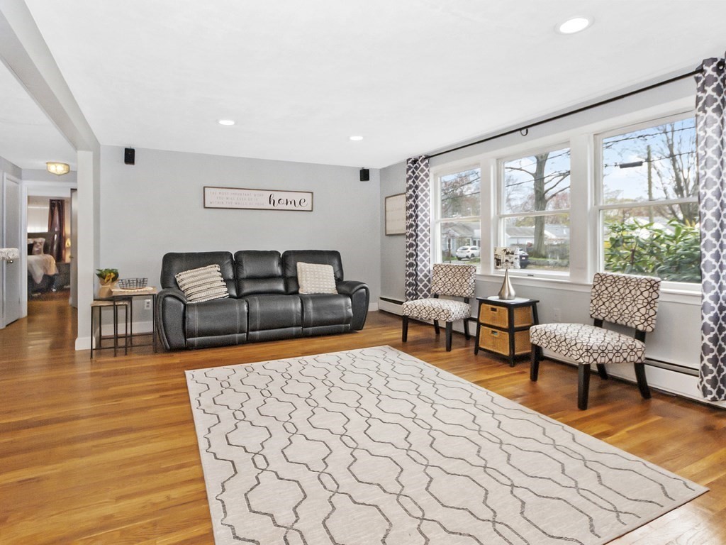 237 Linden Street Waltham, MA 02452 - Photo 12 of 33 a living room with furniture and a large window