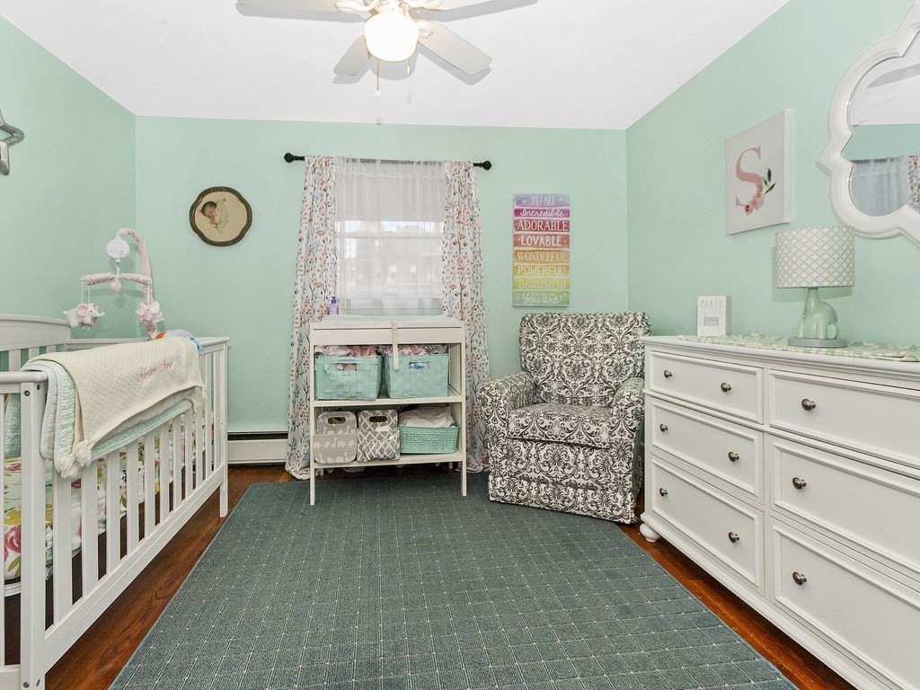 237 Linden Street Waltham, MA 02452 - Photo 21 of 33 a bedroom with furniture and a window