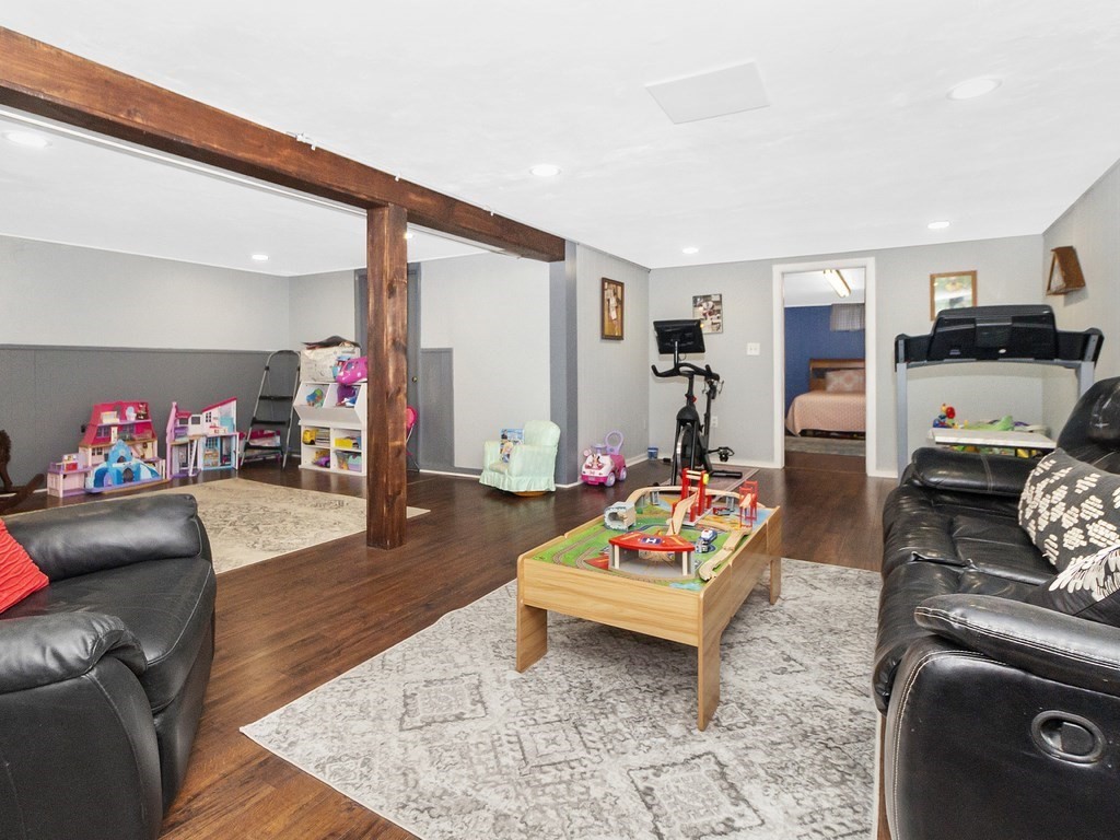 237 Linden Street Waltham, MA 02452 - Photo 24 of 33 a living room with furniture and a couch