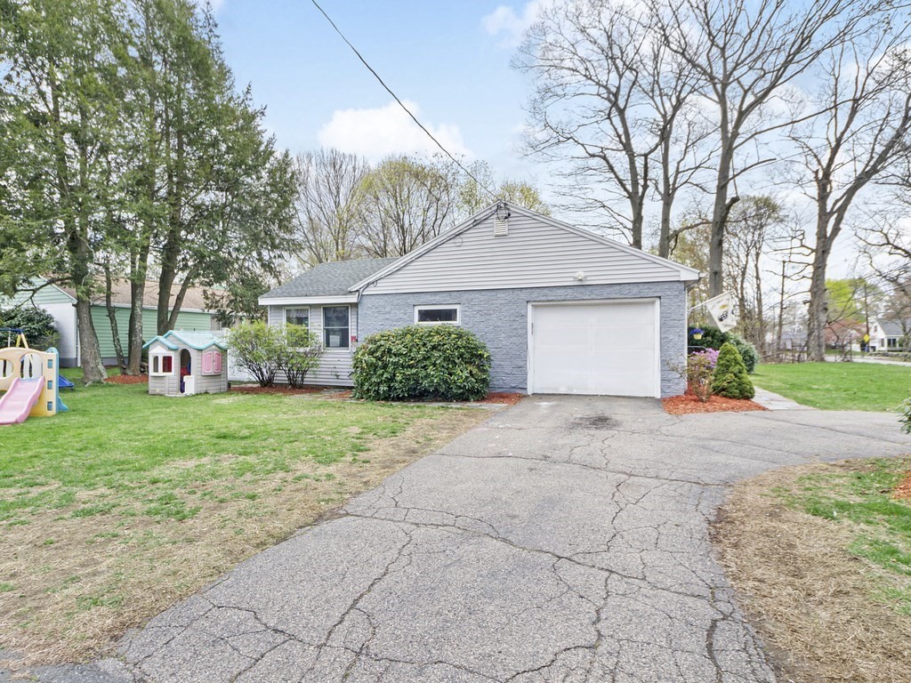 237 Linden Street Waltham, MA 02452 - Photo 33 of 33 a front view of a house with garden