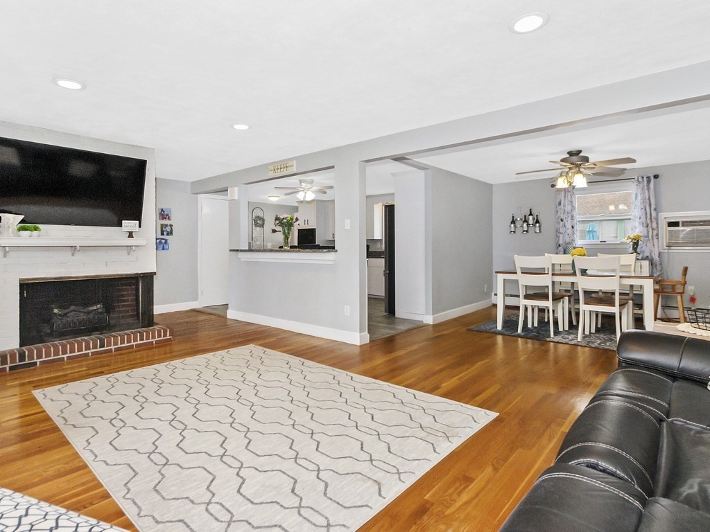 237 Linden Street Waltham, MA 02452 - Photo 10 of 33 a living room with furniture and a flat screen tv
