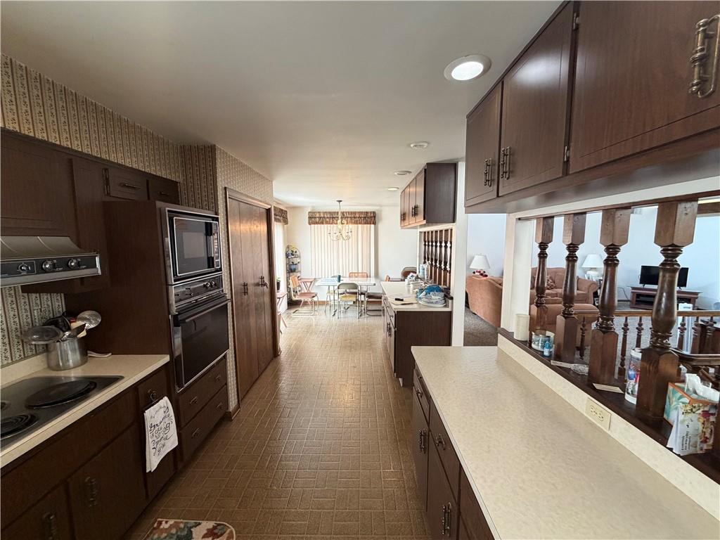 149 Chess Street Monongahela, PA 15063 - Photo 11 of 35 a view of a kitchen with stainless steel appliances a refrigerator a sink dishwasher stove and cabinets