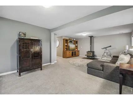 a living room with furniture and a area