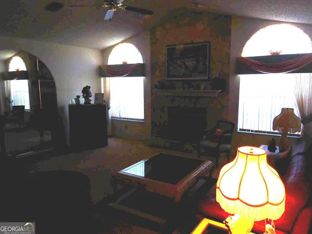 a kitchen with stainless steel appliances a sink stove and refrigerator