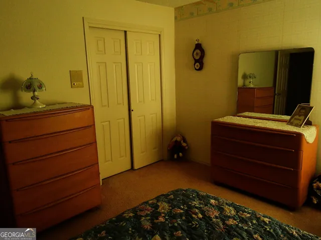 a bathroom with a tub and a window