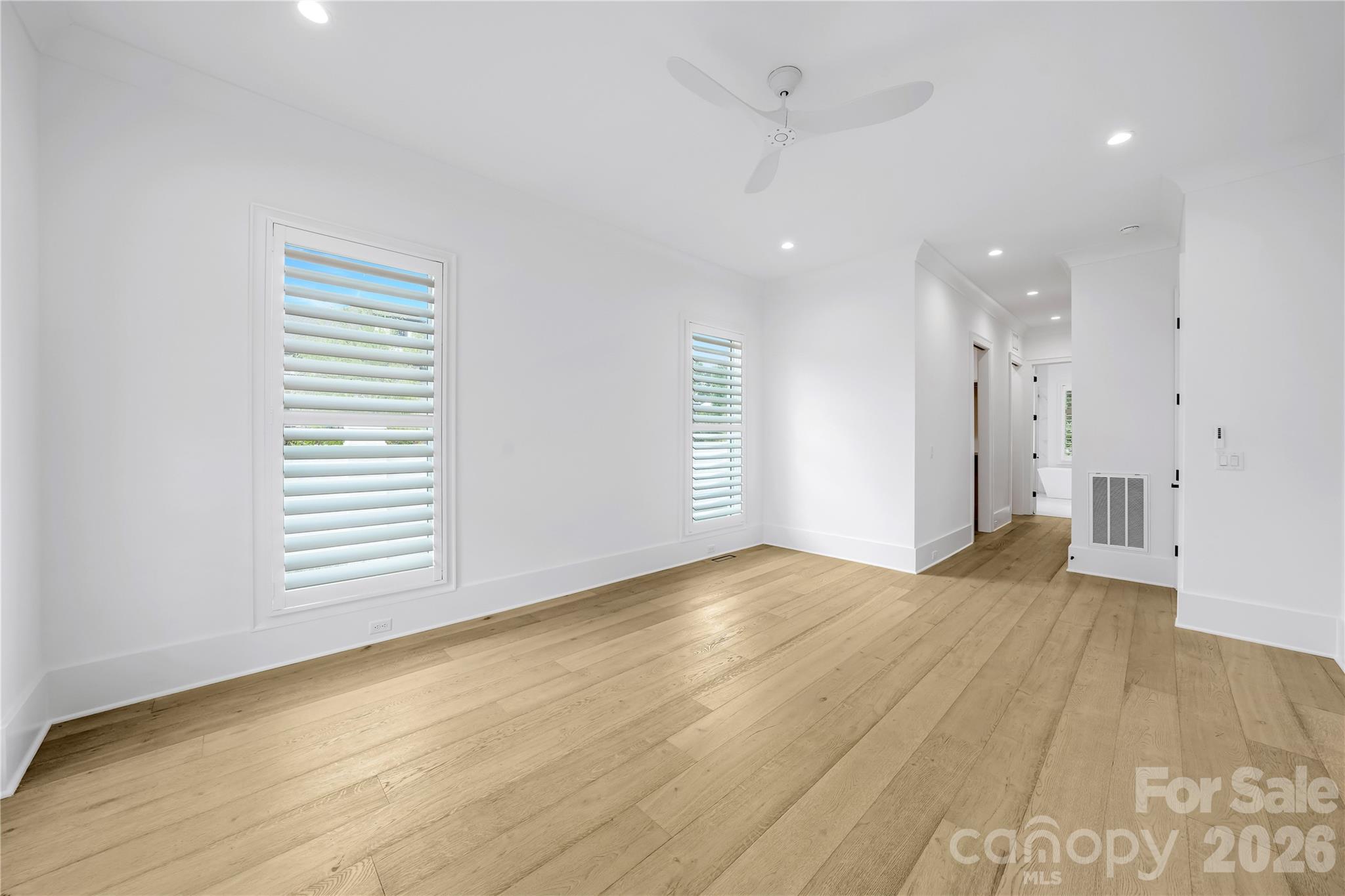 5031 Gilchrist Road, Unit 1A Charlotte, NC 28211 - Photo 26 of 46 a view of an empty room with a window