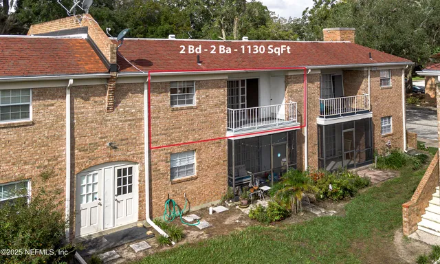 a kitchen with cabinets a sink and appliances