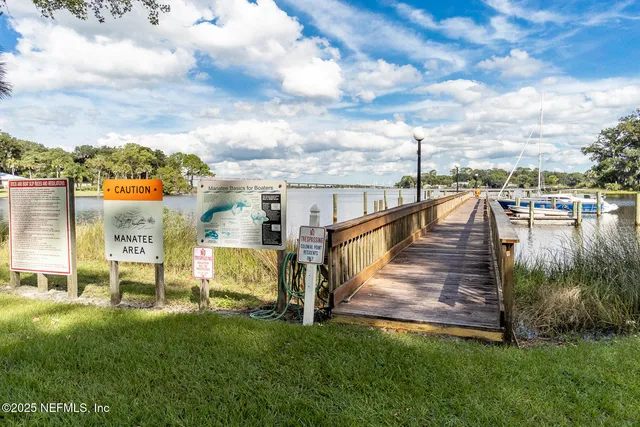 a view of a street with houses