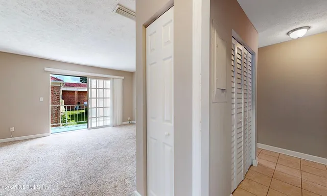 a view of an empty room with window