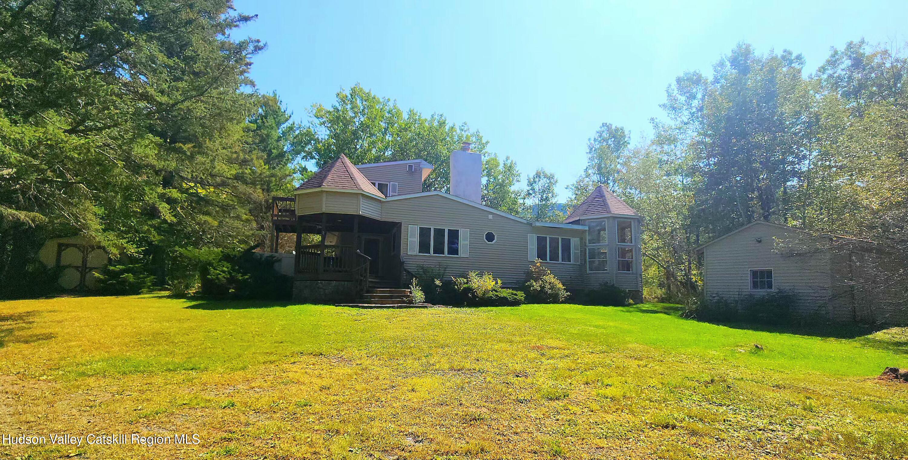 436 Big Hollow Road Maplecrest, NY 12454 - Photo 23 of 31 a view of a house with a yard