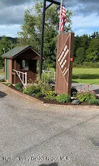 a view of building with trees in the background