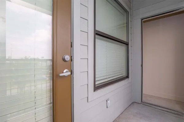 a bathroom with a granite countertop sink toilet a large mirror a bathtub and shower