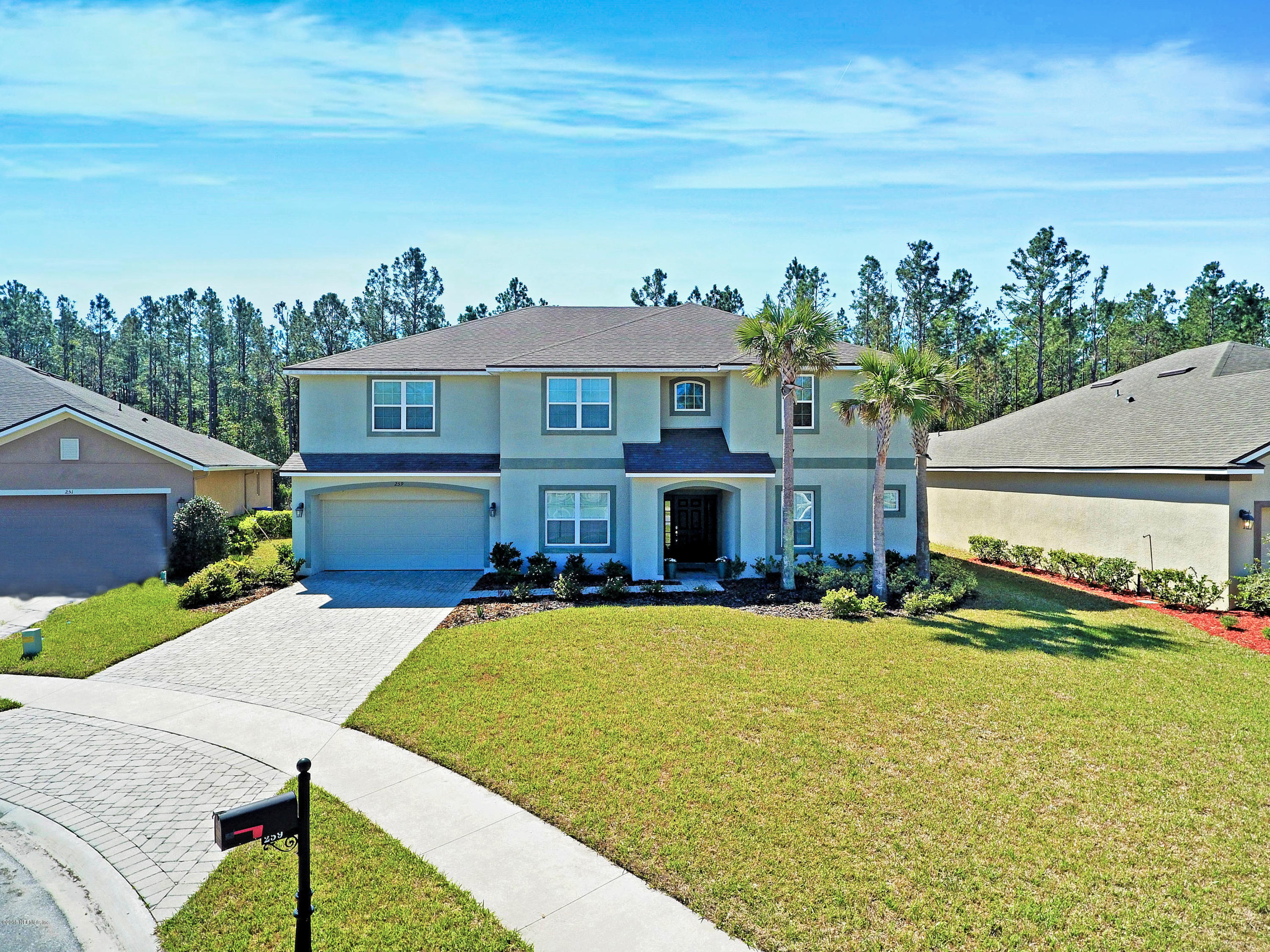 259 Esmeralda Road St. Augustine, FL 32095 - Photo 1 of 64 front with long paver driveway