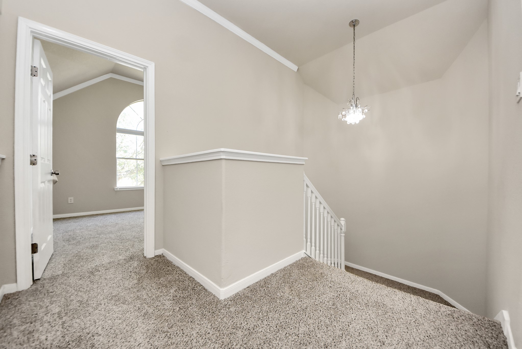 18715 Keystone Oak Street Houston, TX 77084 - Photo 30 of 50 an empty room with windows and entrance
