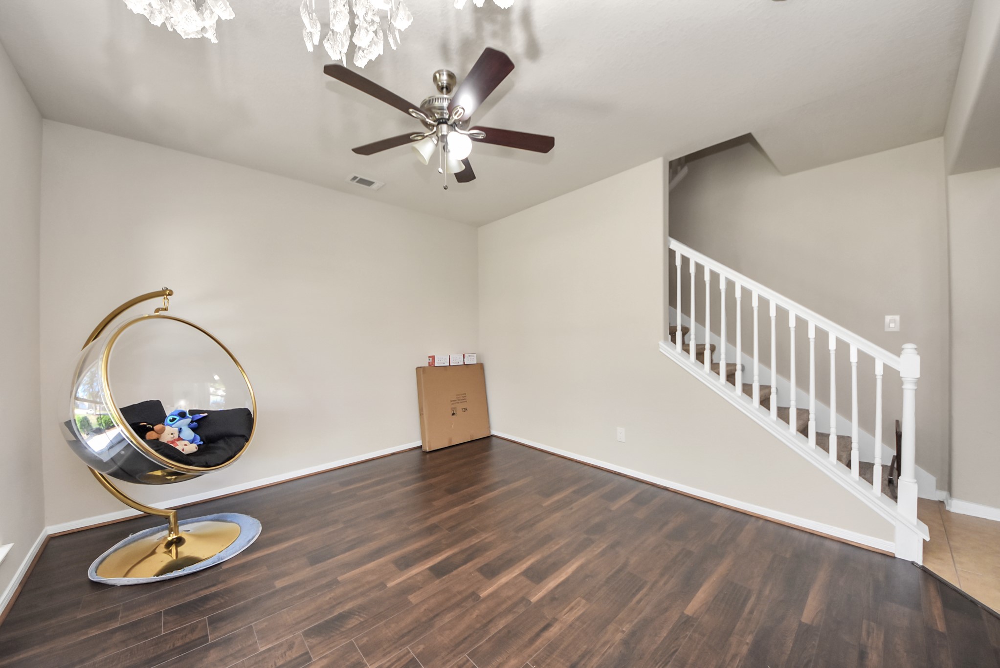 18715 Keystone Oak Street Houston, TX 77084 - Photo 4 of 50 a view of an empty room with wooden floor
