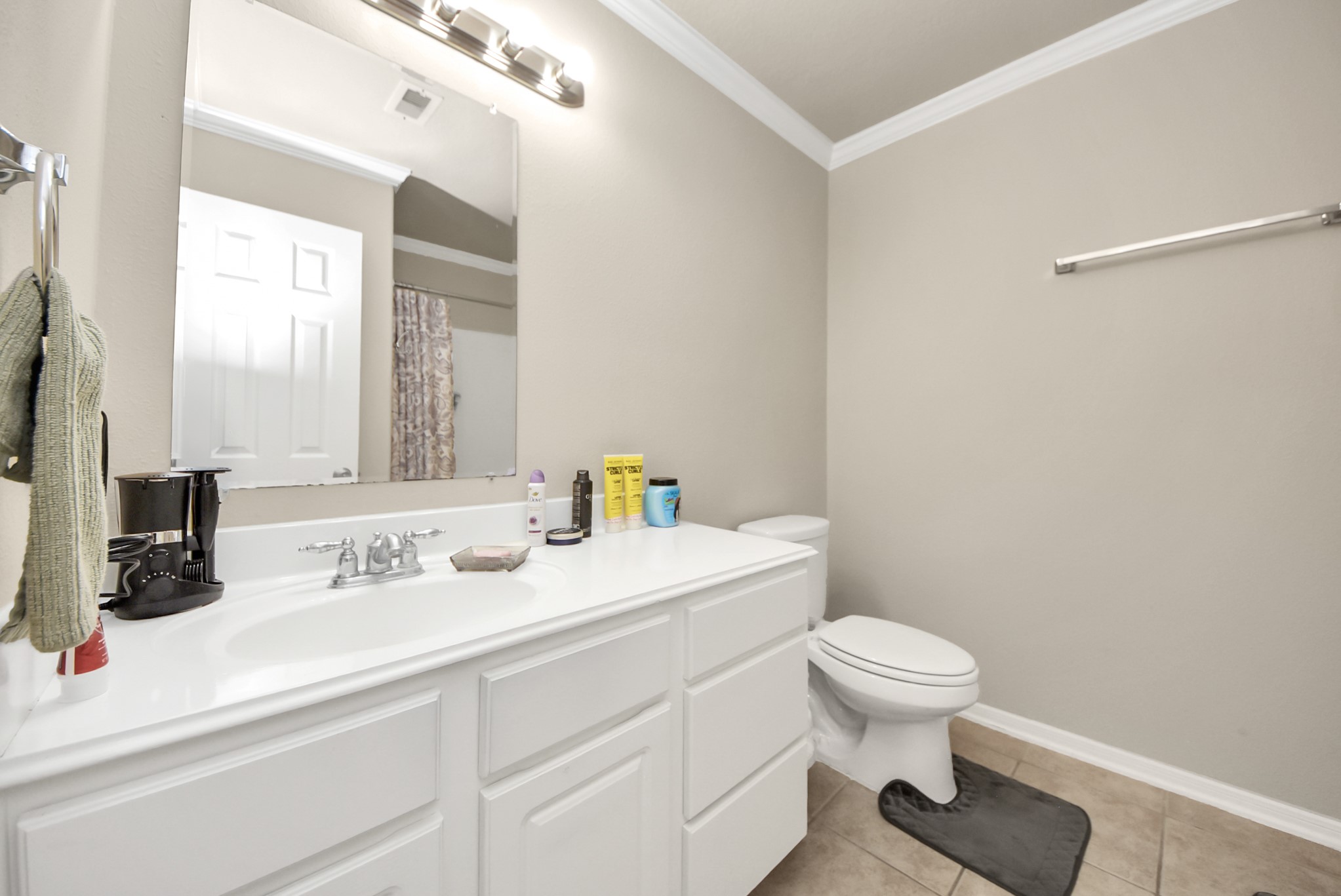 18715 Keystone Oak Street Houston, TX 77084 - Photo 41 of 50 a bathroom with a sink toilet and mirror