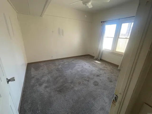 a dining room table with chairs and a table