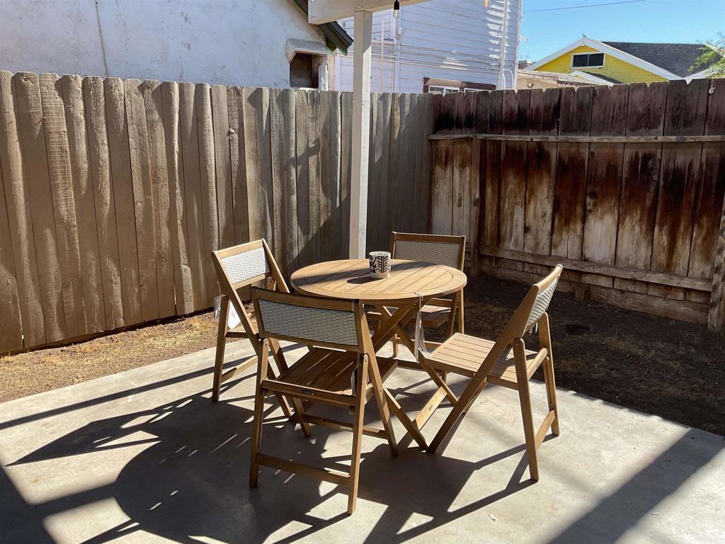 1115 South 6th Street El Centro, CA 92243 - Photo 17 of 19 a dining room table with chairs and a table